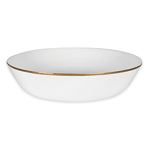White ceramic bowl with a gold rim for elegant serving