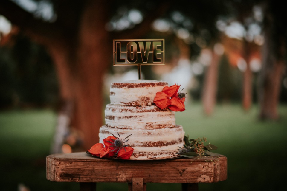 Naked cake with love topper