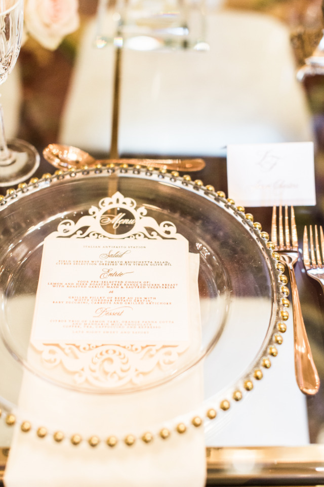 gold and clear wedding charger and menu