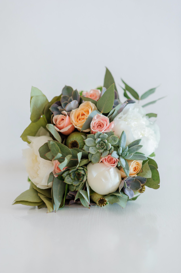 pink and white wedding bouquet with succulents