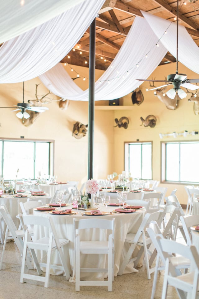 beautifully draped reception space with cafe lighting