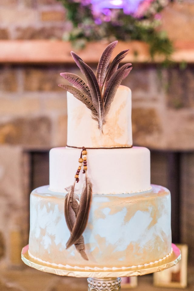 boho wedding cake with feathers