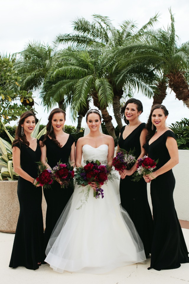 Love the bridesmaids in black dresses