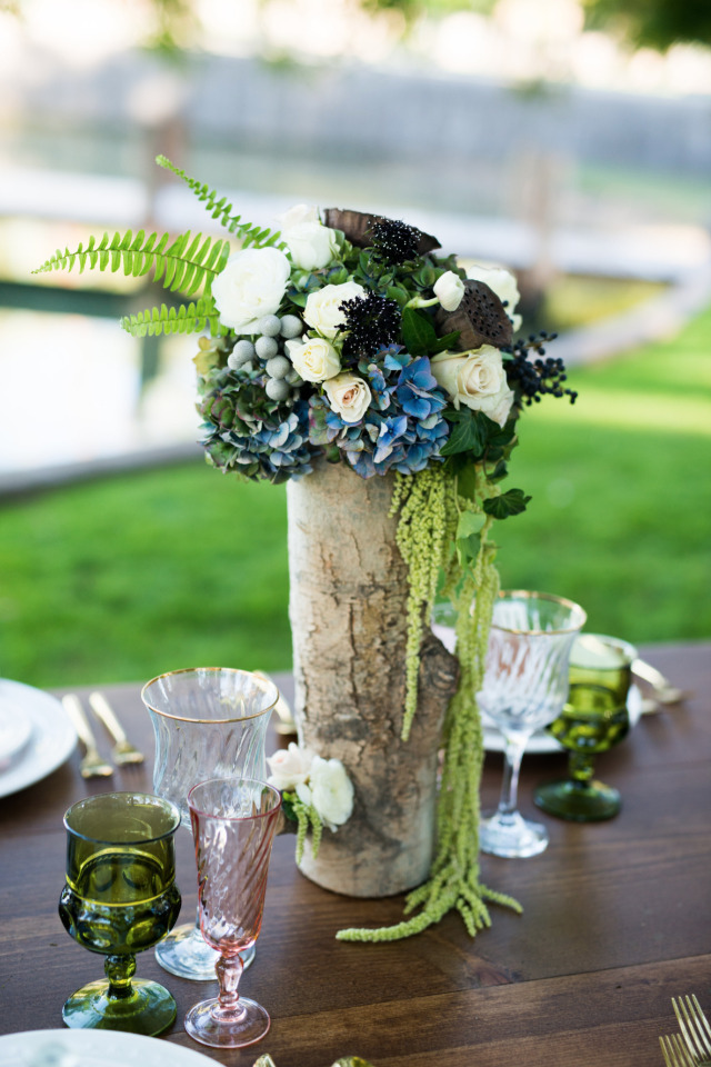 tall wedding centerpiece in wood vase
