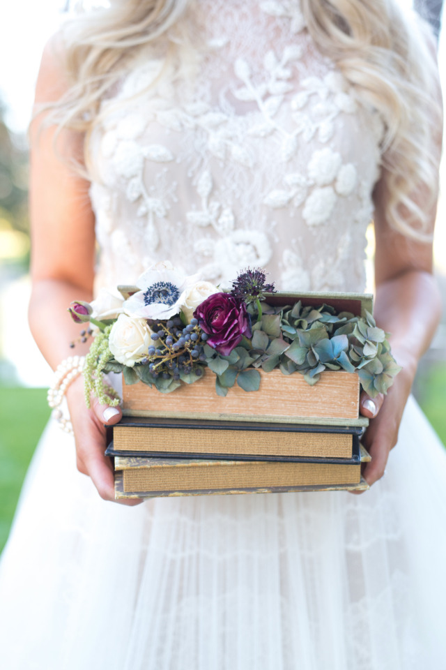 books and flowers wedding decor