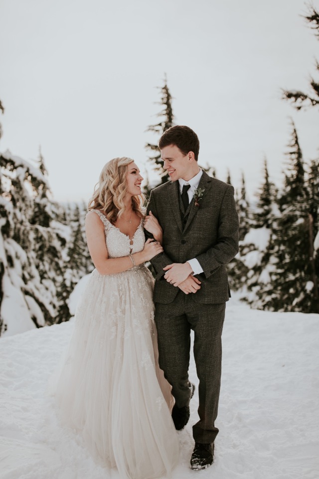 bride and groom in love on a mountain top