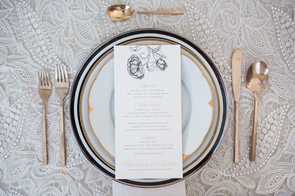 glam black gold and white place setting