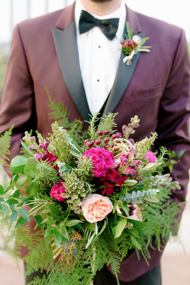 wedding bouquet in green and deep pinks