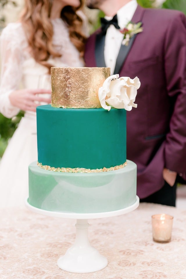modern style wedding cake in gold and green