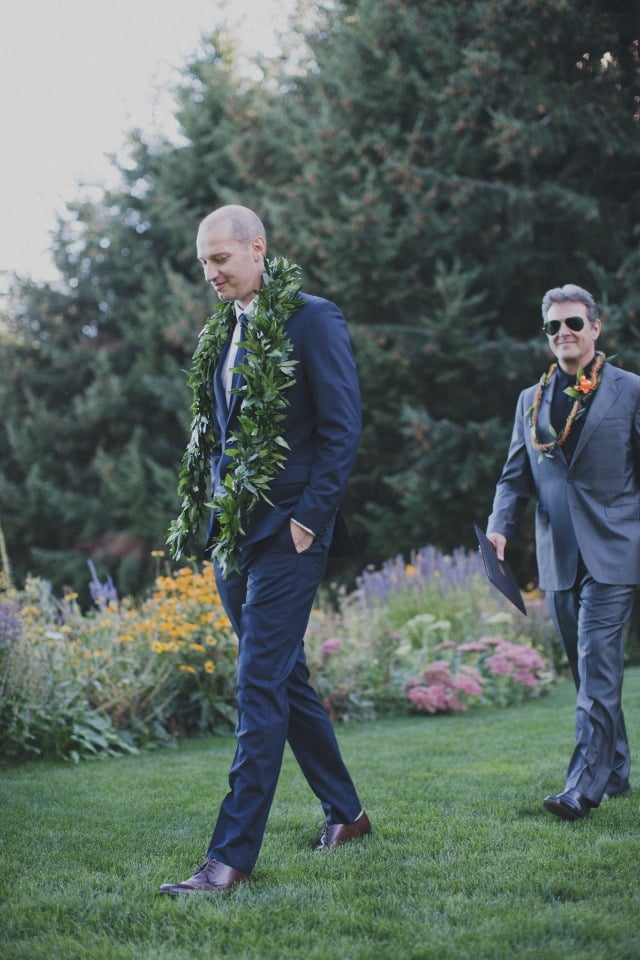 groom with wedding lei