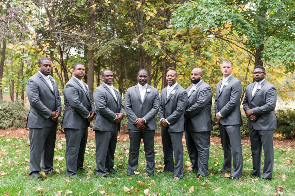 groom and his men in grey suits