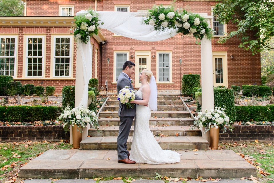 elegant flower accented wedding arch