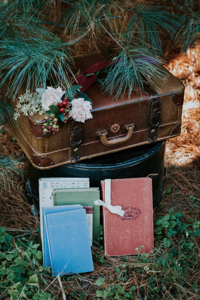 Vintage suitcase and books