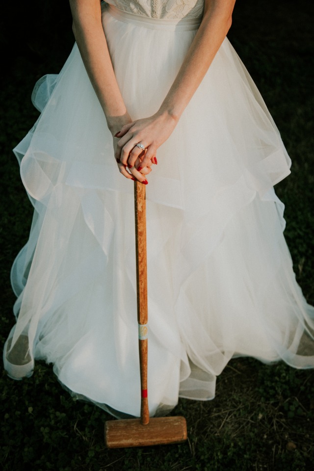 Bride playing croquet