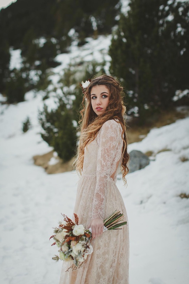 Boho winter bride in lace gown
