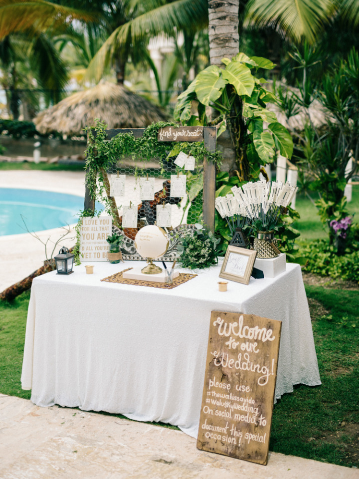 green and gold wedding welcome table