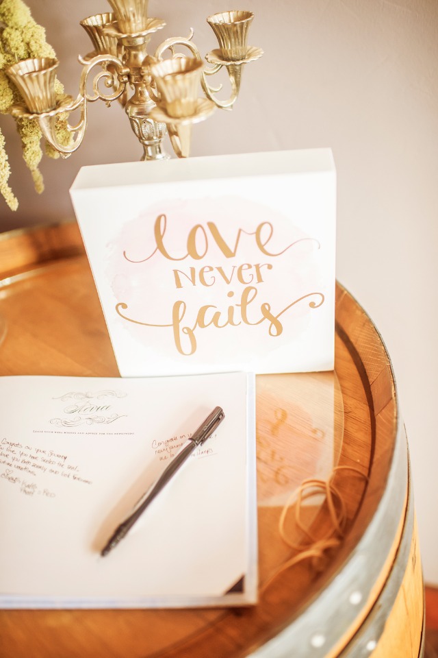 love never fails wedding sign and guest book
