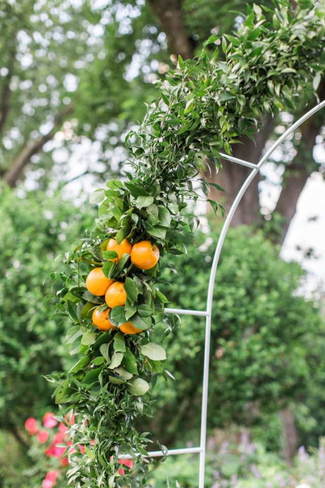 orange accents for your wedding arch