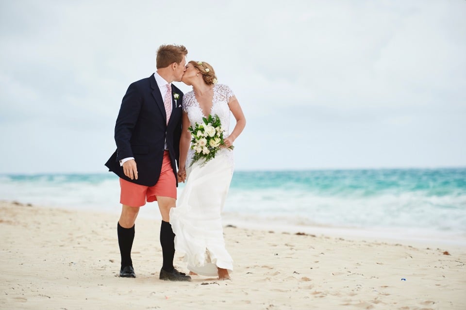 wedding kiss at Coral Beach Club