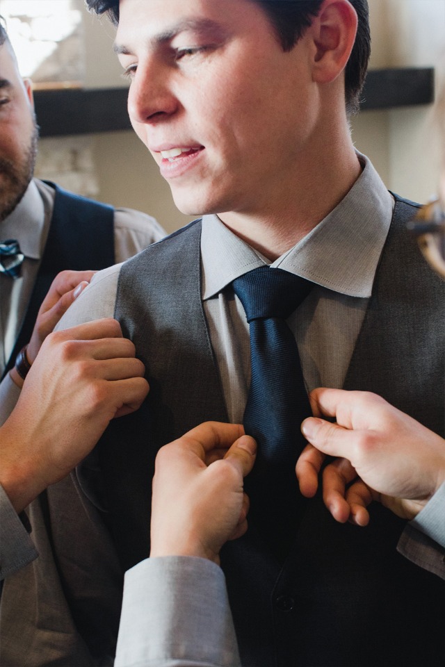 Groomsmen getting ready in their Generation Tux suits