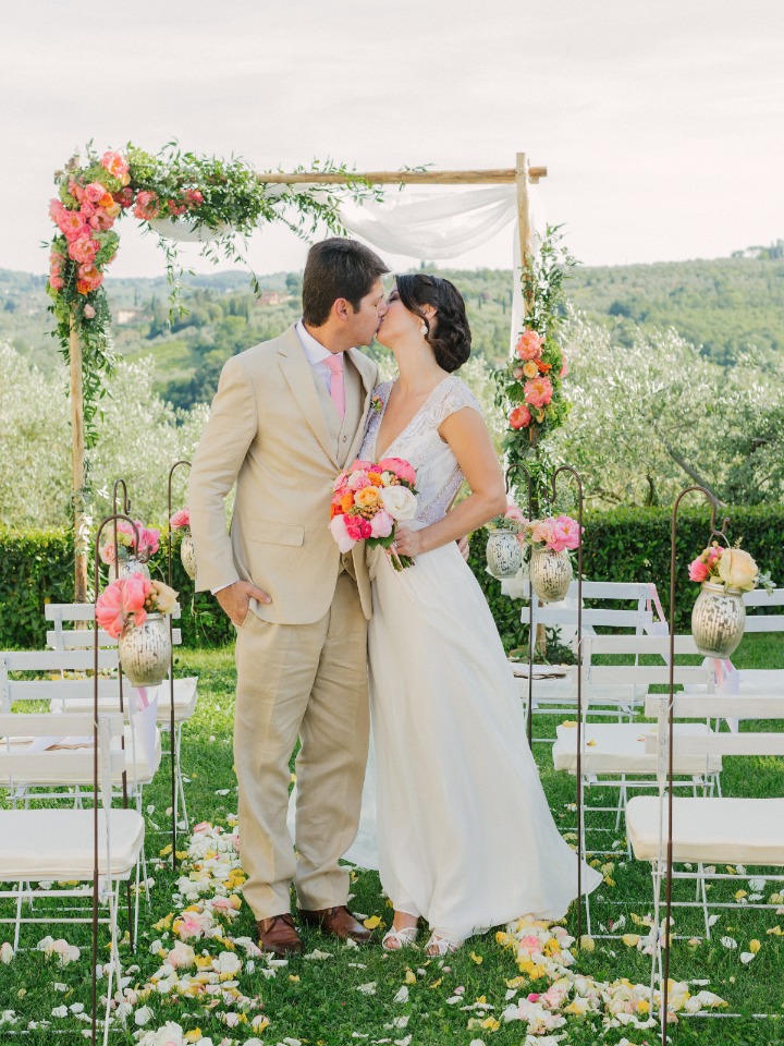 Flower filled outdoor ceremony in Tuscany