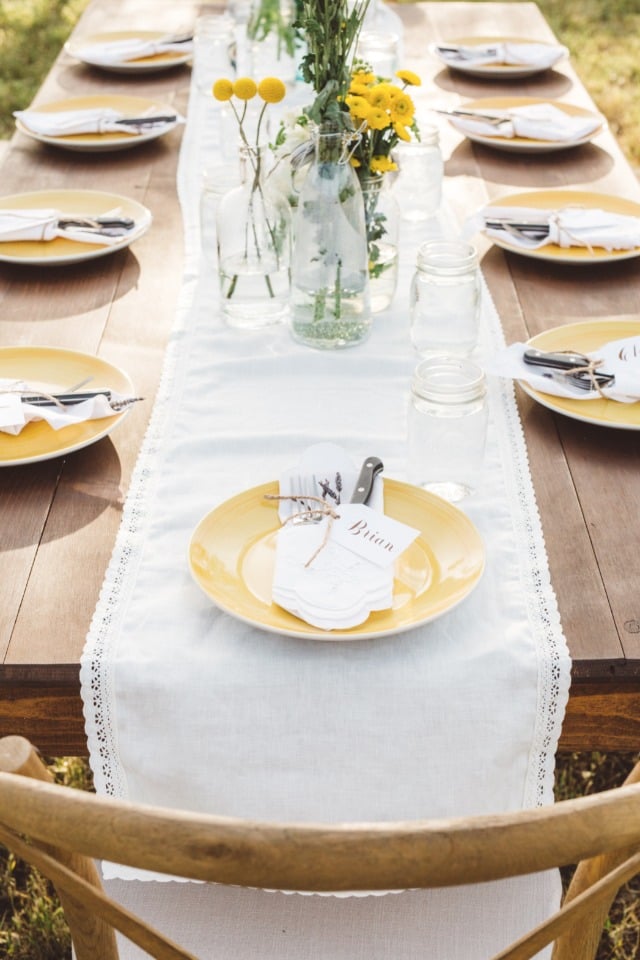 white and yellow wedding table decor
