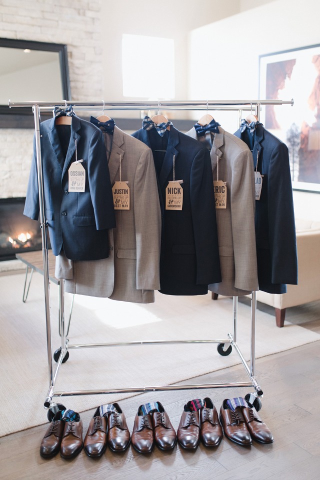 Groomsmen suits hanging up from Generation Tux