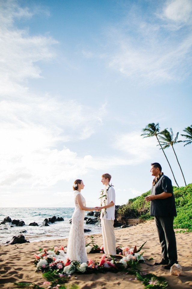 saying "I do" on a beach in Hawaii
