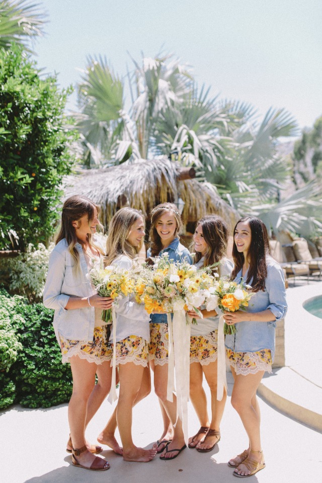 bride and her bridesmaids in getting ready outfits