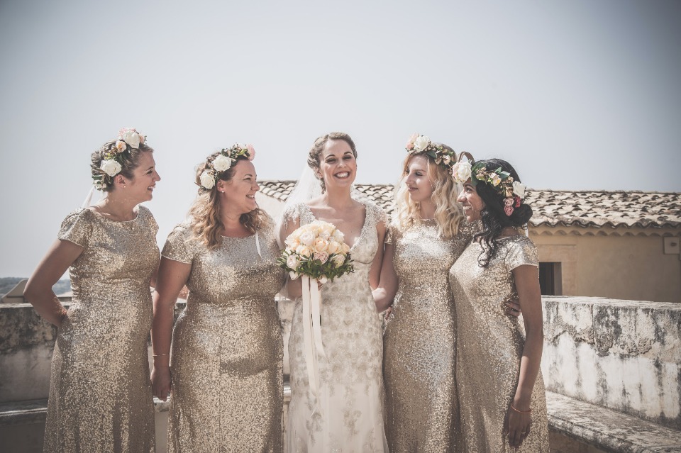Bridesmaids in gold dresses
