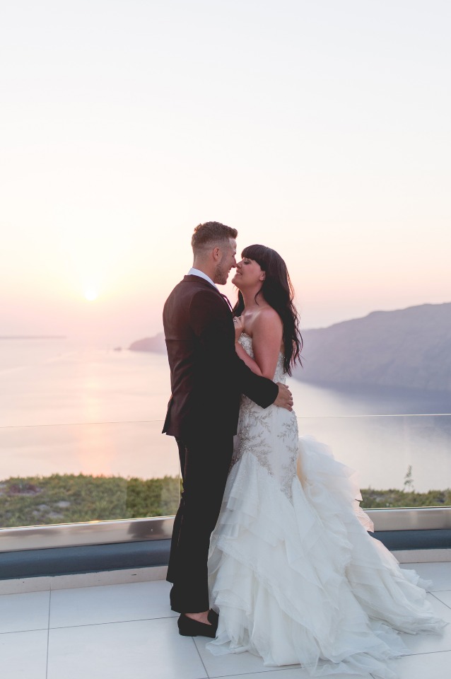 sunset wedding kiss
