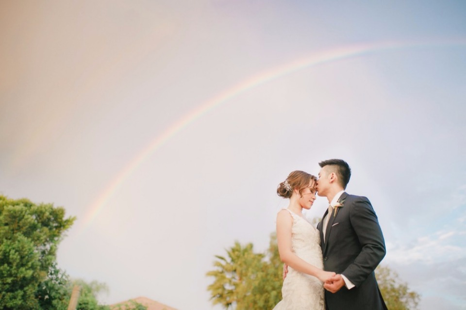 How much more romantic could it get? Oh, well it got even mote romantic! This couple got a rainbow as their backdrop.