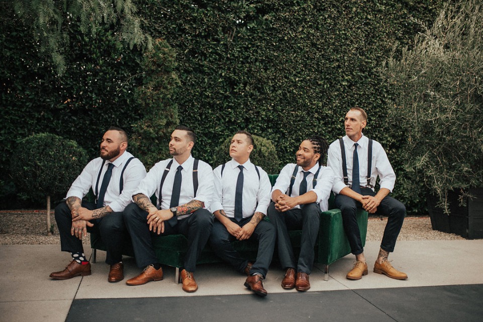 groomsmen in tie and suspenders