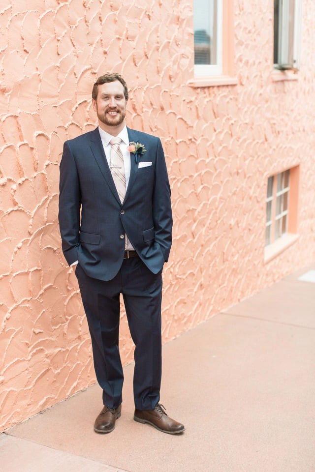 navy groom suit with peach tie