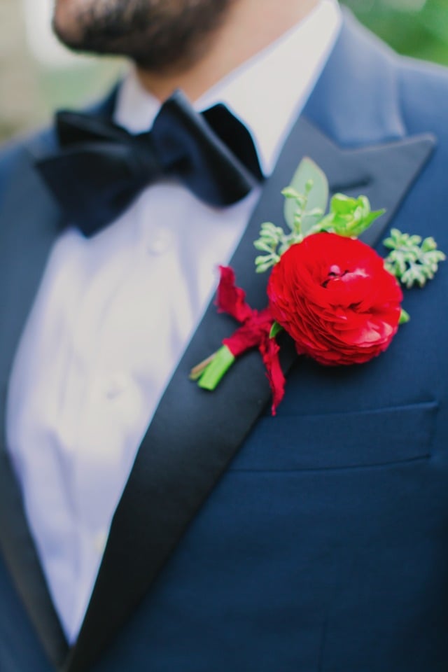Navy two tone suit with the red boutonniere