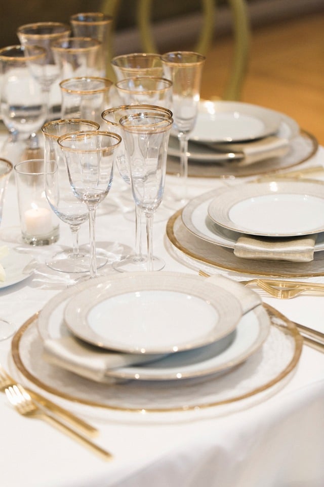 formal dinner reception table decor in gold and white