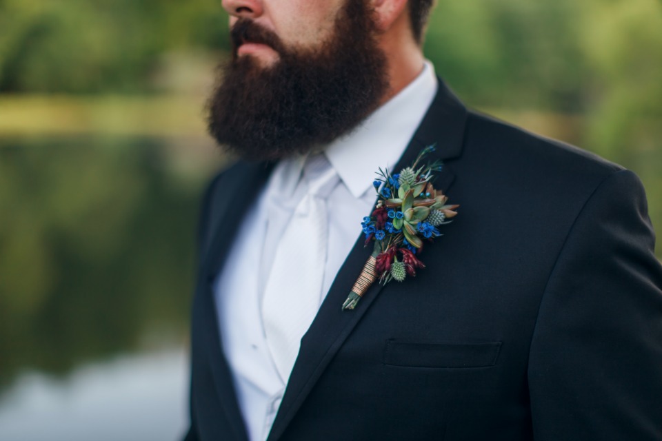 white and black groom style colorful boutonniere