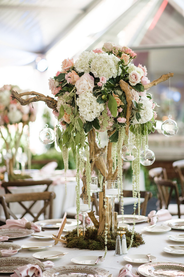wood and floral wedding centerpiece