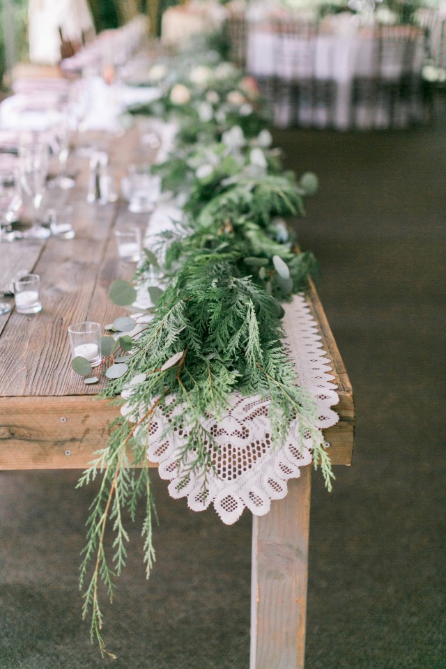 Mixed greenery with lace runner