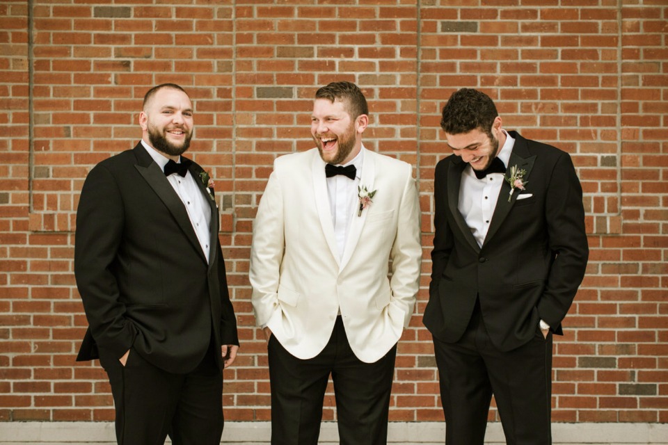 groom and groomsmen in black and white