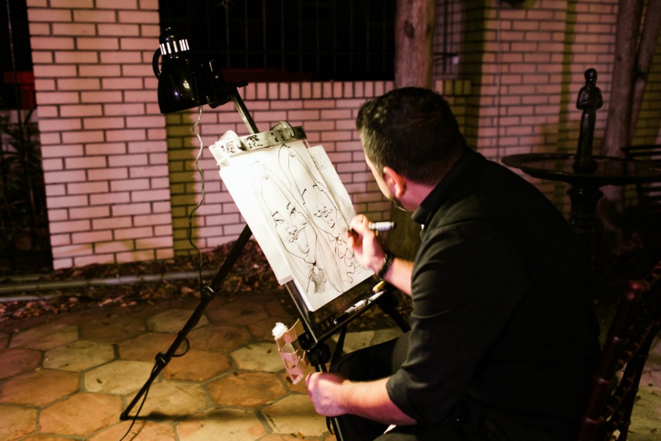 caricature artist instead of a photo booth
