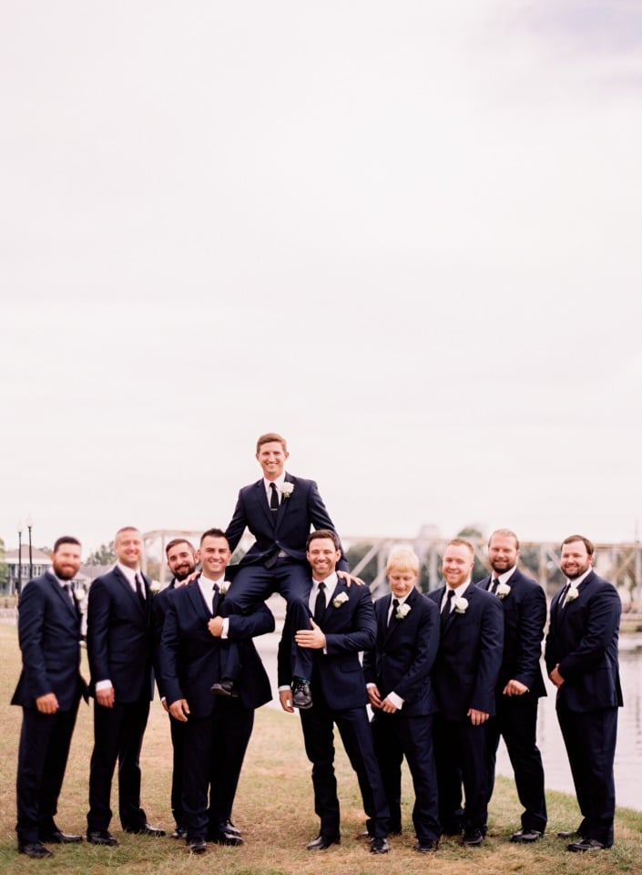 Grooms and his men in Navy suits