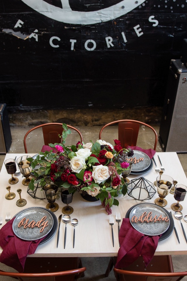 Industrial inspired table setting with burgundy and copper