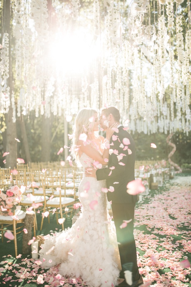 Sunset and petal toss wedding photo idea