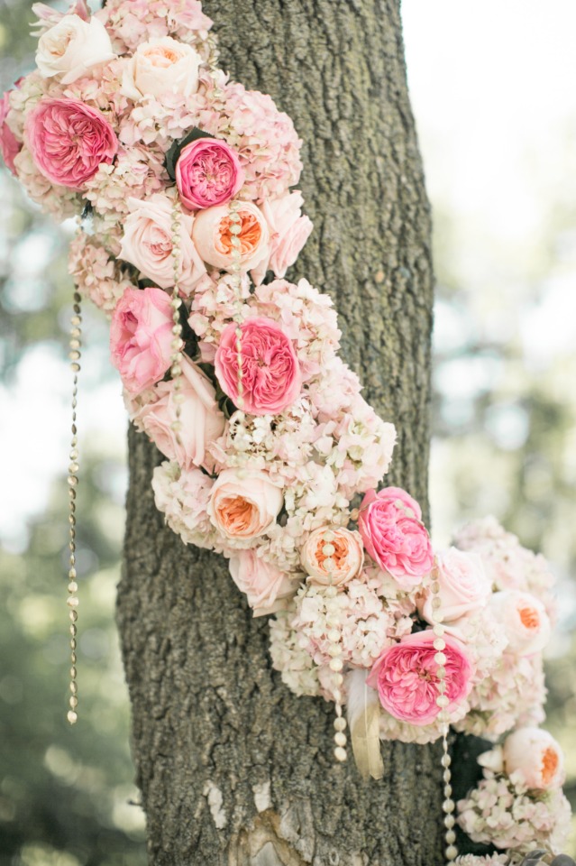 flower garland wrapped trees