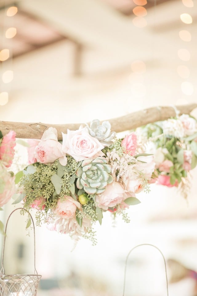 table halos with roses and succulent s