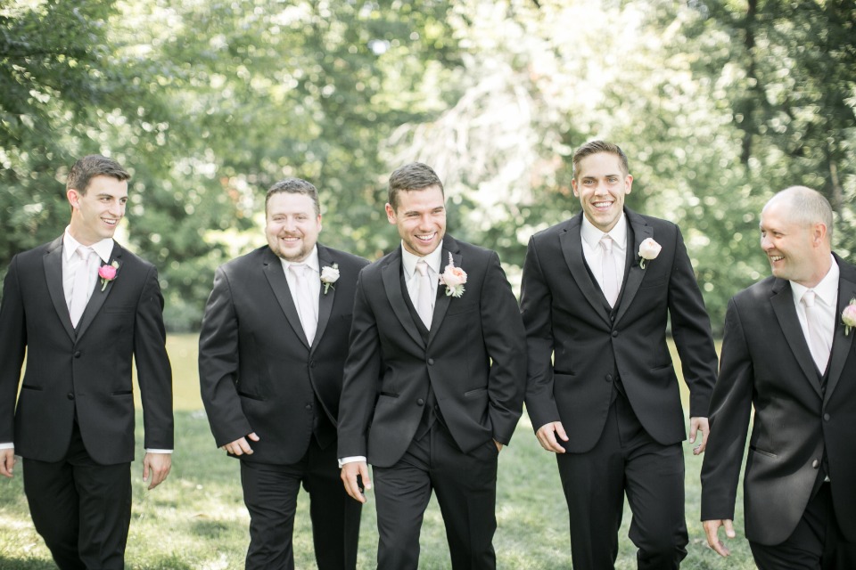 groom and his men in black and ivory