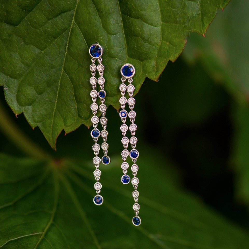 Sapphire and diamond dangle earrings from Shane Co