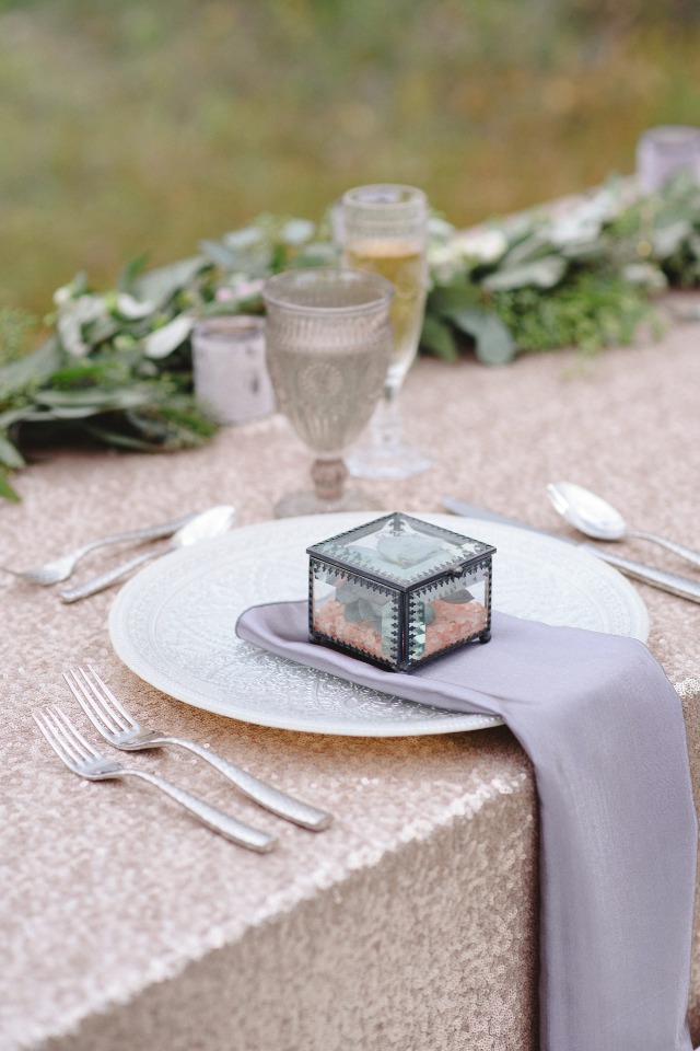 champagne and silver table setting