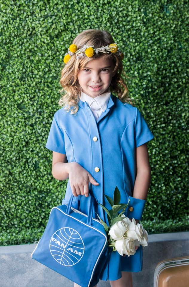 flower girl in vintage Pan Am uniform